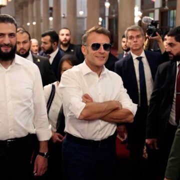 Explosions shake Damascus as Macron visits